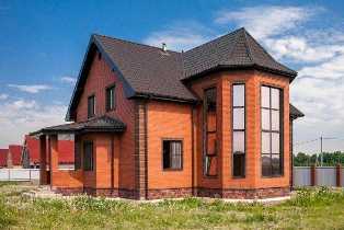 Дома из кирпича: надежность и прочность строительного материала