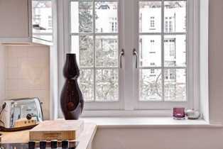 Как деревянные окна помогают сохранить тепло в доме